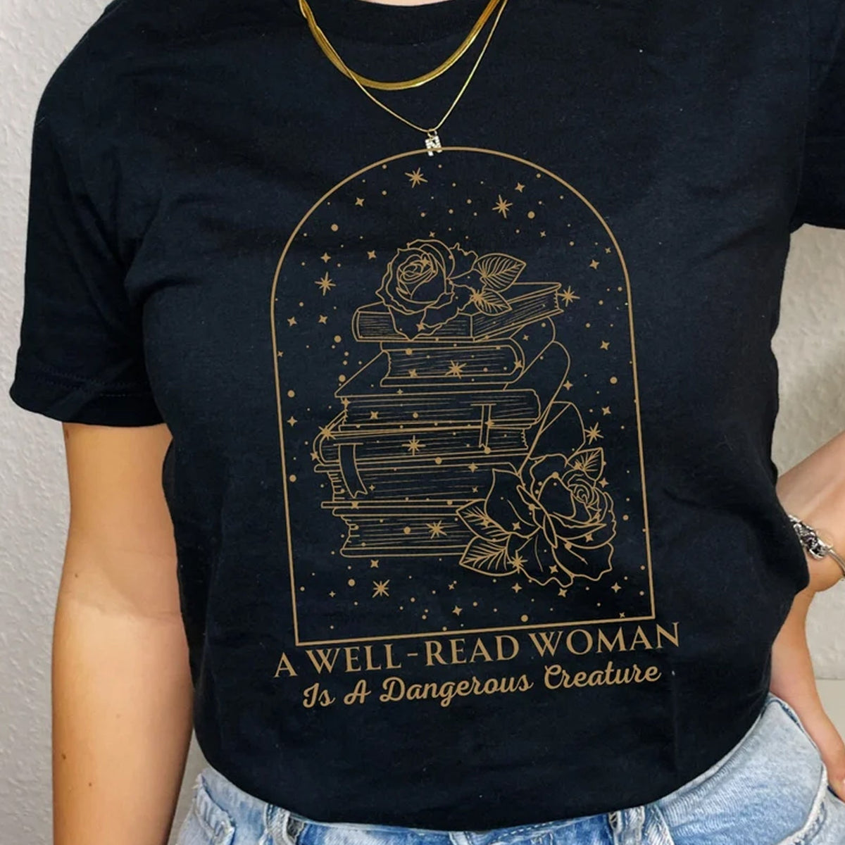 A Well Read Woman is a Dangerous Creature Graphic Tee product image 1